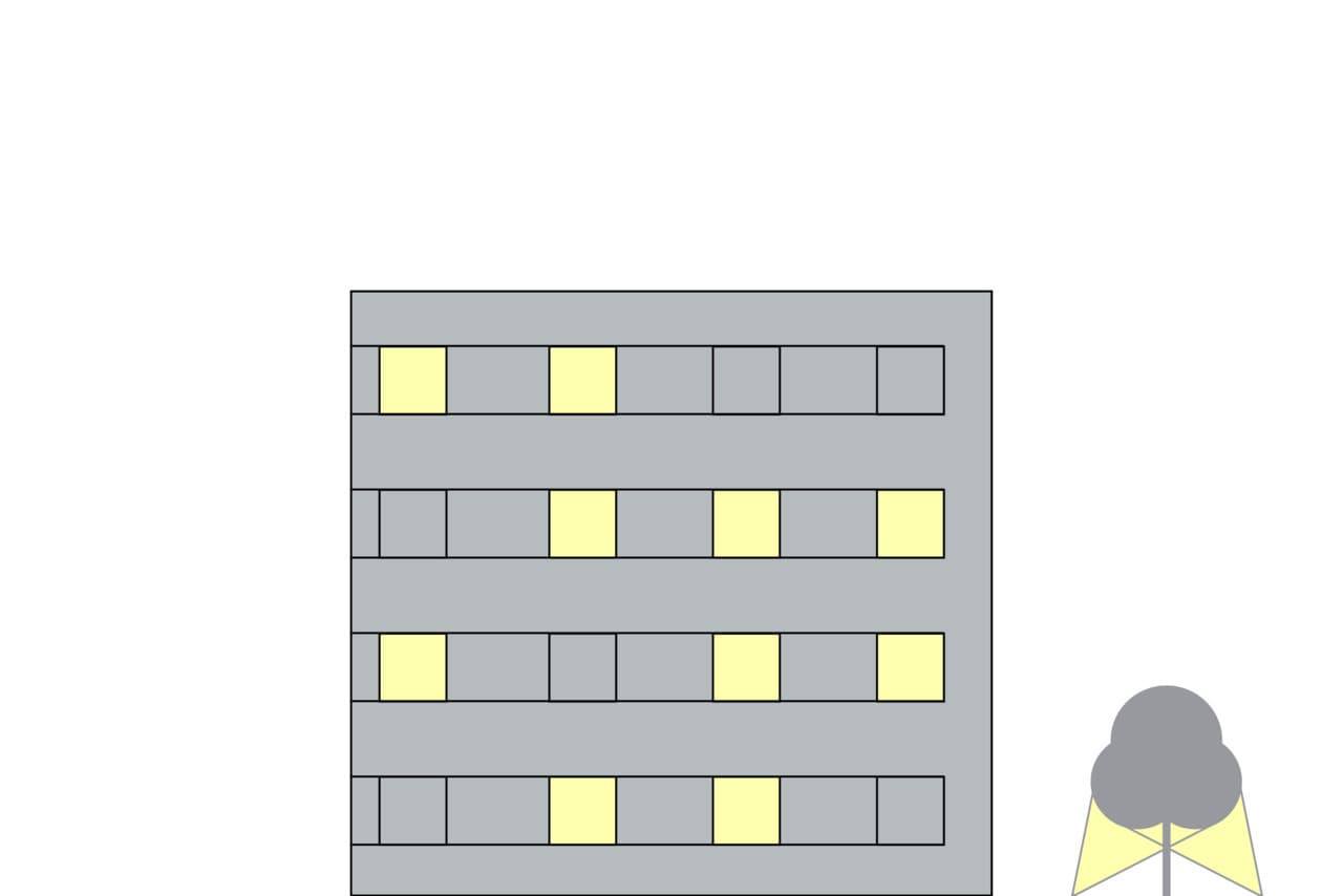 Bürogebäude mit ERCO Beleuchtung für zonale Arbeitsplatzbeleuchtung.