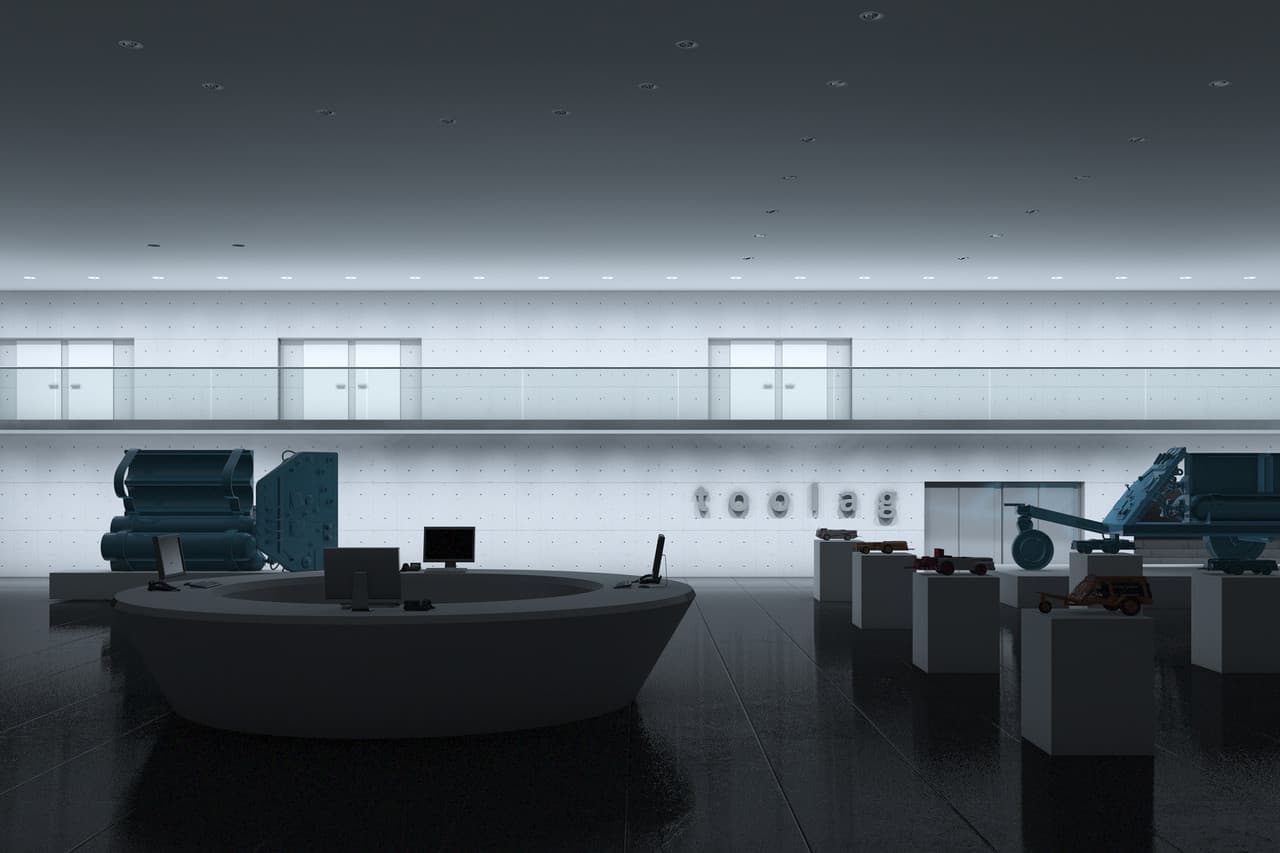 Firmenfoyer mit Produktdisplays, beleuchtet mit ERCO Lichtlösungen für eine ansprechende Produktpräsentation.
