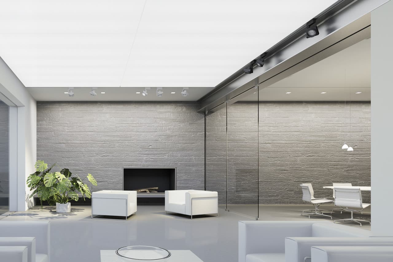 ERCO Lichtdesign: Helle Decke und Akzentbeleuchtung schaffen räumliche Tiefe und betonen Objekte in einem modernen Interieur.