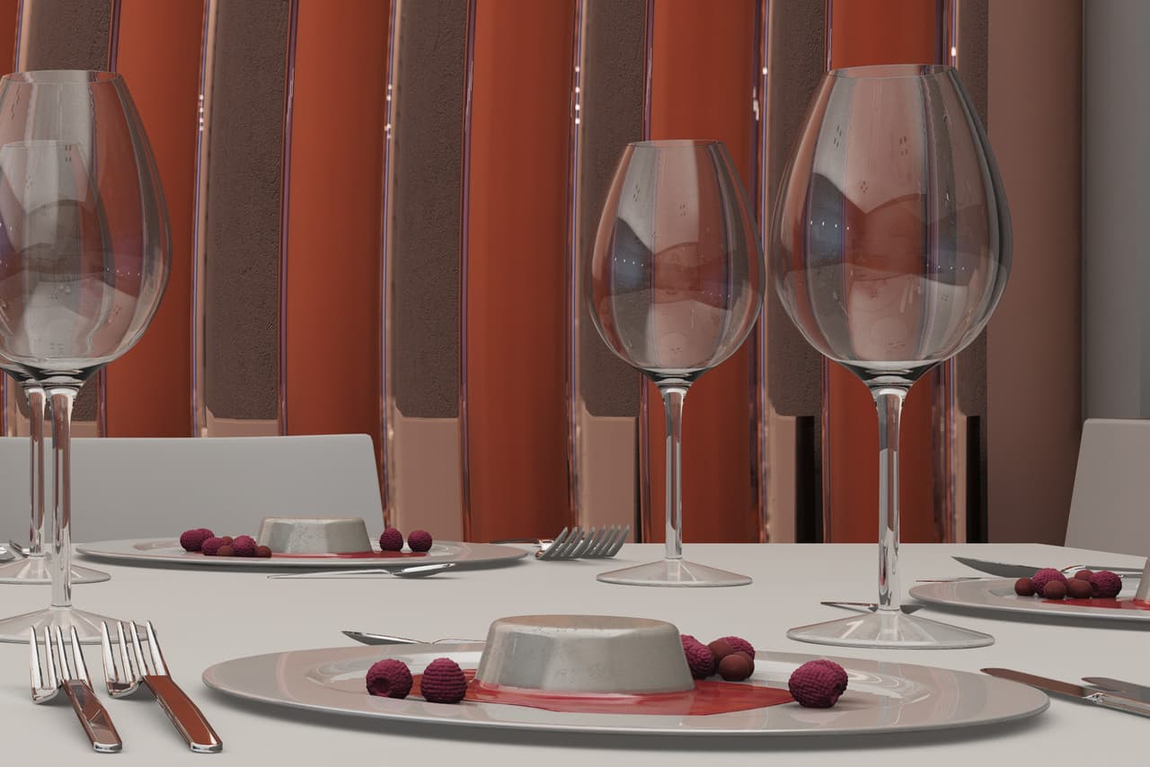 Tischgedeck mit Weingläsern und Dessert, das die Brillanz des Lichts hervorhebt.