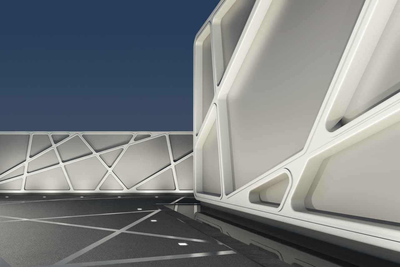 Architektonische Fassade mit geometrischem Muster und neutraler Beleuchtung für räumliche Gestaltung.