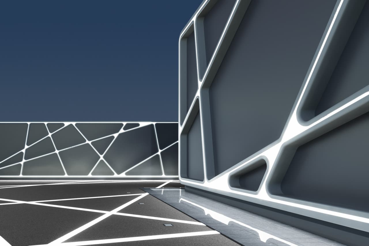 Architekturfassade mit geometrischem Lichtdesign und ERCO Lichtmustern.