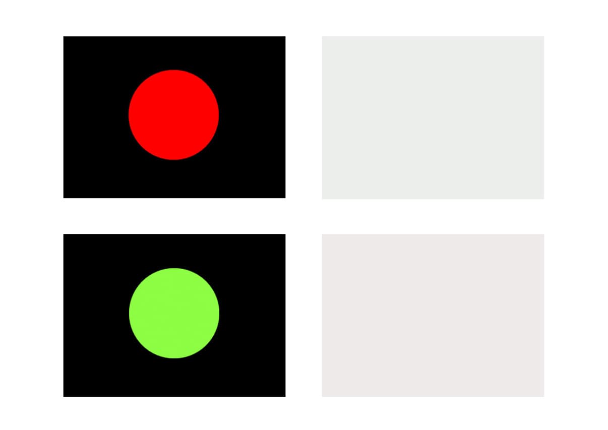 Farbkontraste in der Lichtplanung: Rot und Grün auf Schwarz, Weißtöne als Designelemente.