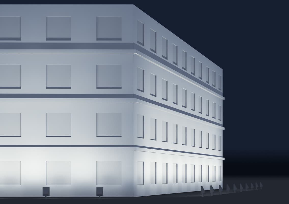 Fassadenbeleuchtung eines modernen Bürogebäudes mit ERCO Lichtprojektoren.