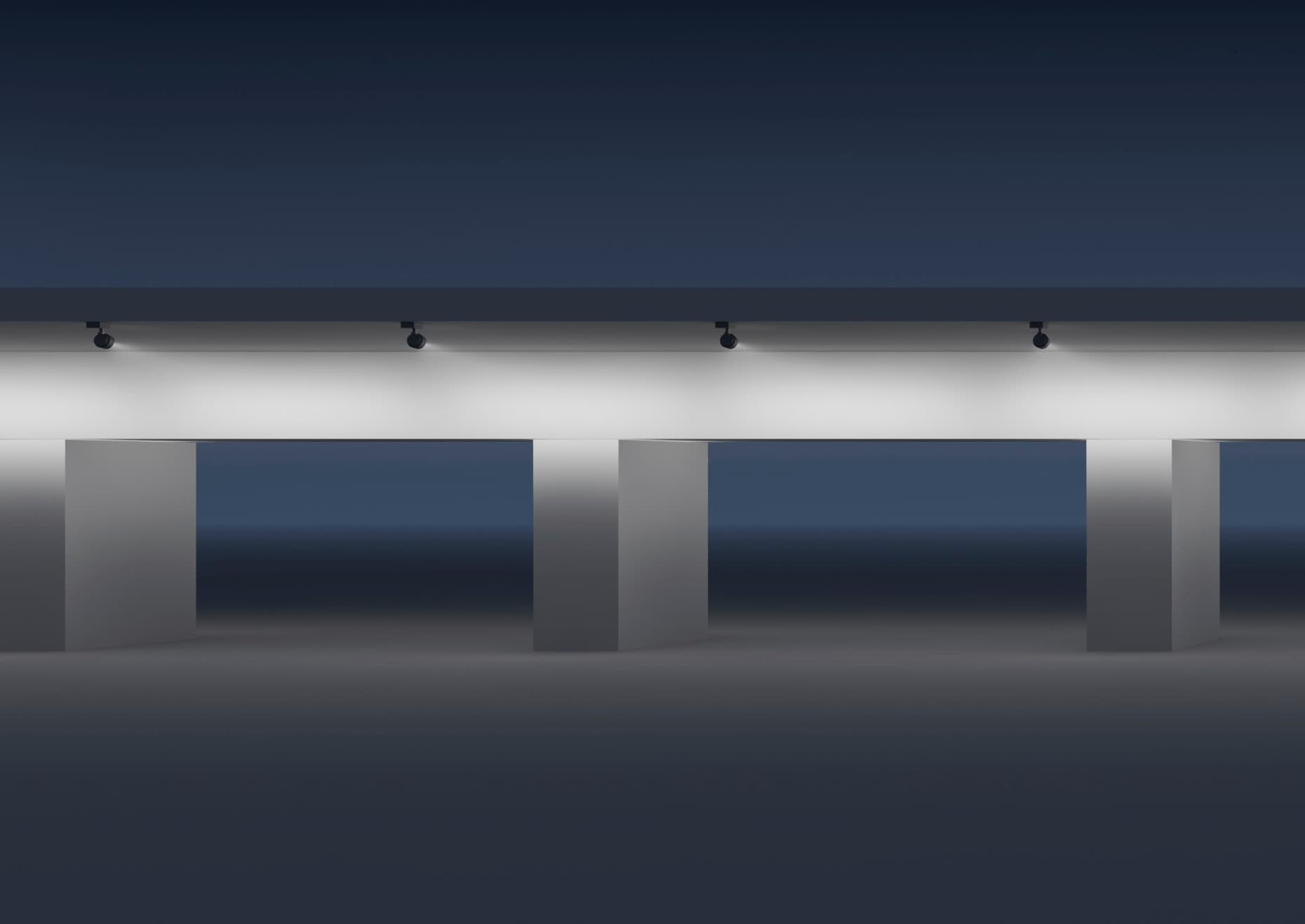 ERCO Strahler beleuchten eine moderne Brückenkonstruktion, die architektonische Details hervorhebt.