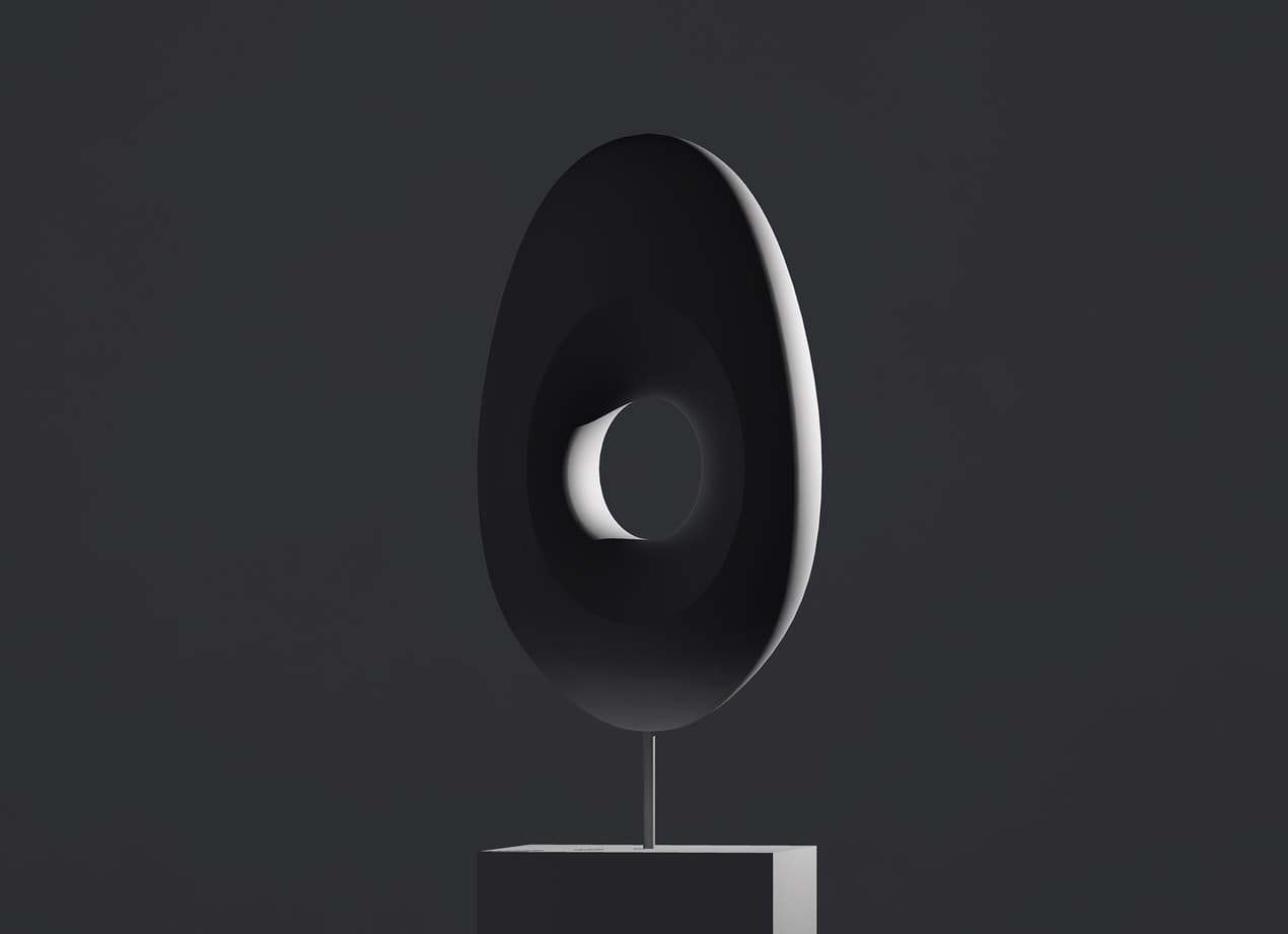 Abstrakte Skulptur mit Loch, betont durch Lichtmodellierung für Akzentbeleuchtung.