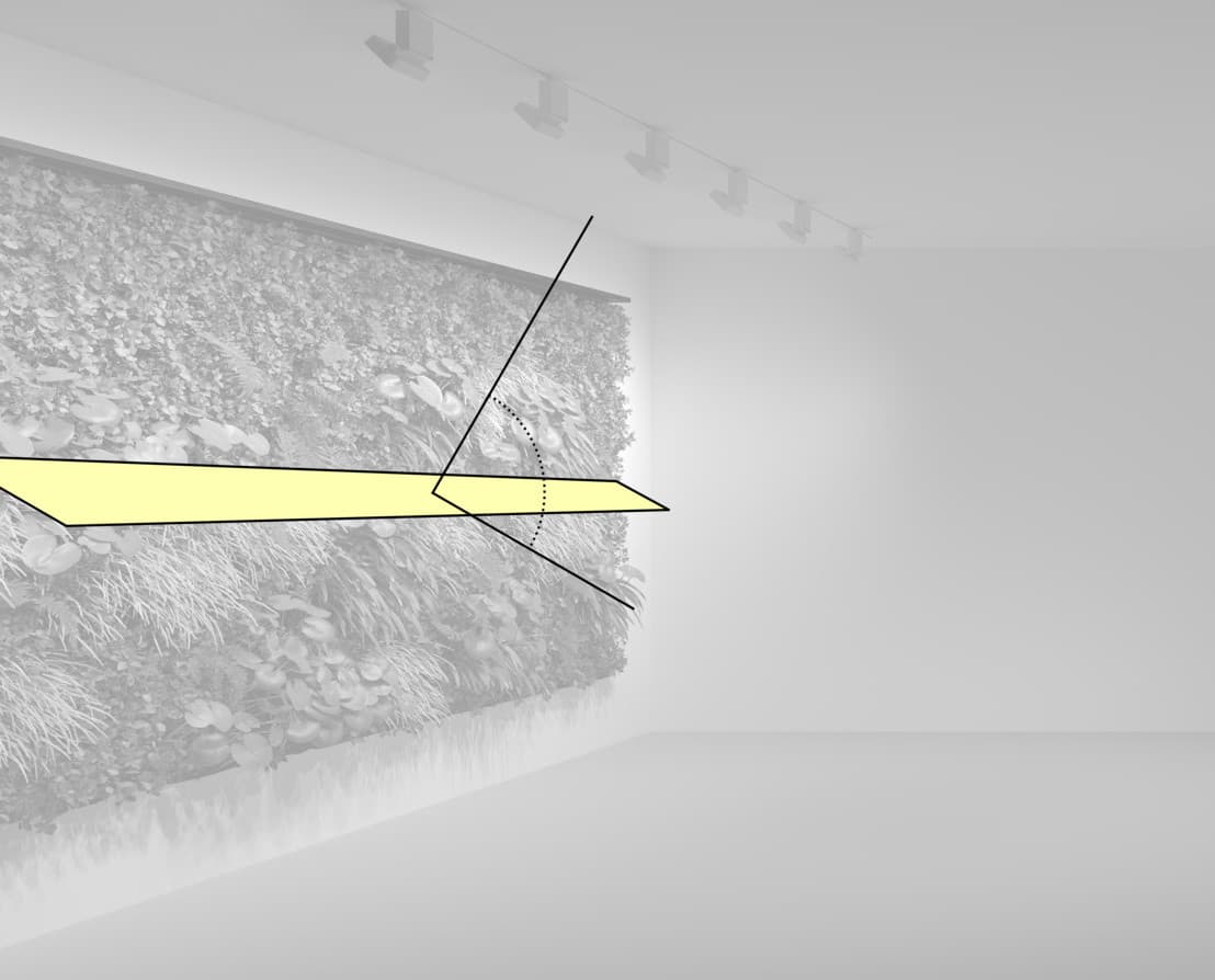 ERCO Lichtplanung für eine grüne Wand mit optimaler Ausleuchtung und Lichtverteilung.