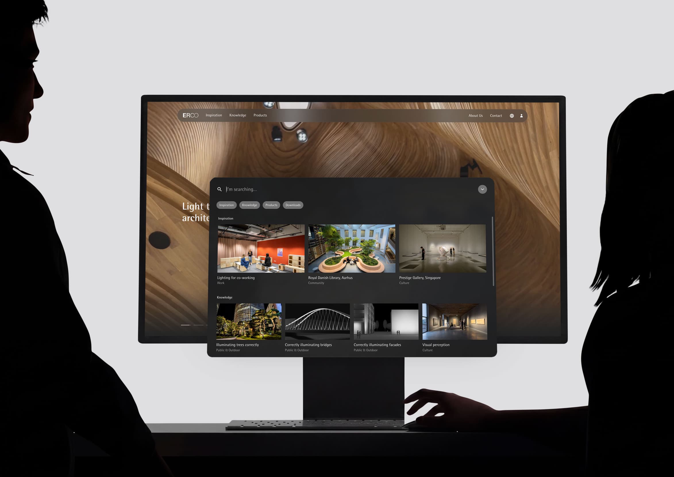 People looking at a screen with the ERCO search visible