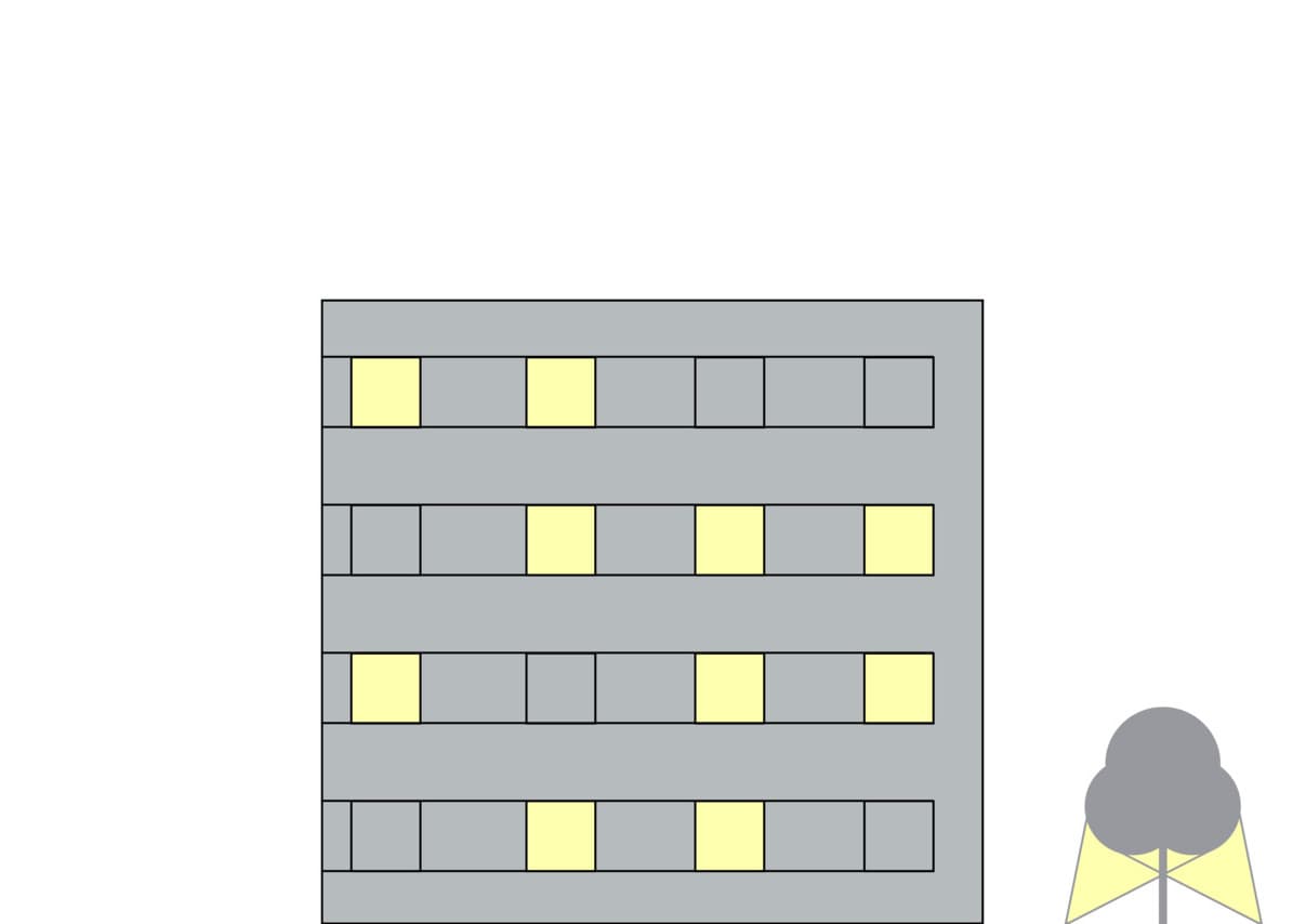 Bürogebäude mit ERCO Beleuchtung für zonale Arbeitsplatzbeleuchtung.