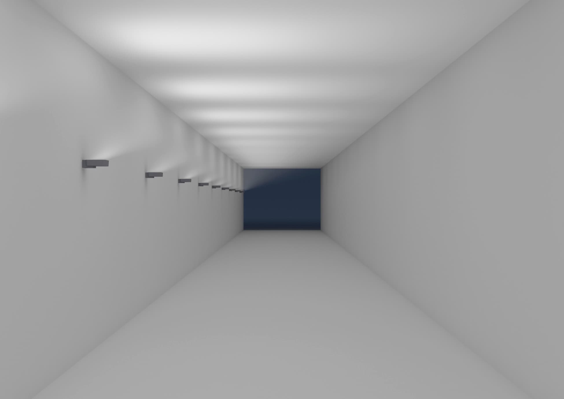 ERCO Wandleuchten beleuchten einen Bahnhofstunnel und sorgen für Orientierung und Sicherheit.