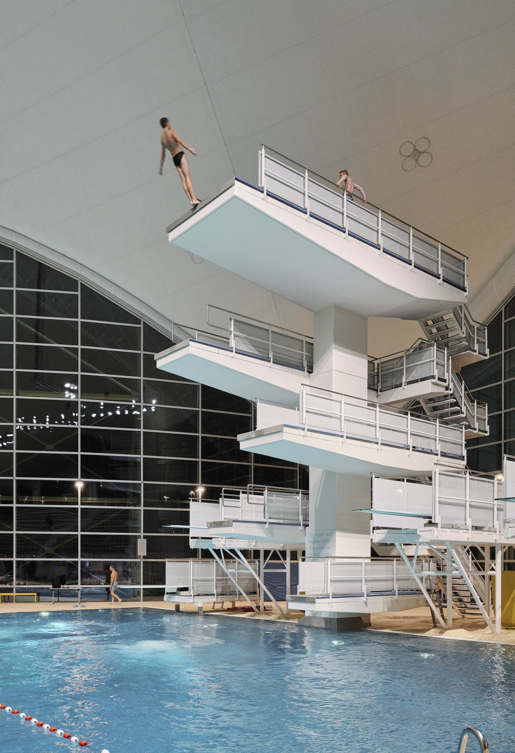 Springer auf dem Sprungturm im Aquatic Centre, Olympiapark München, mit ERCO LED-Beleuchtung.