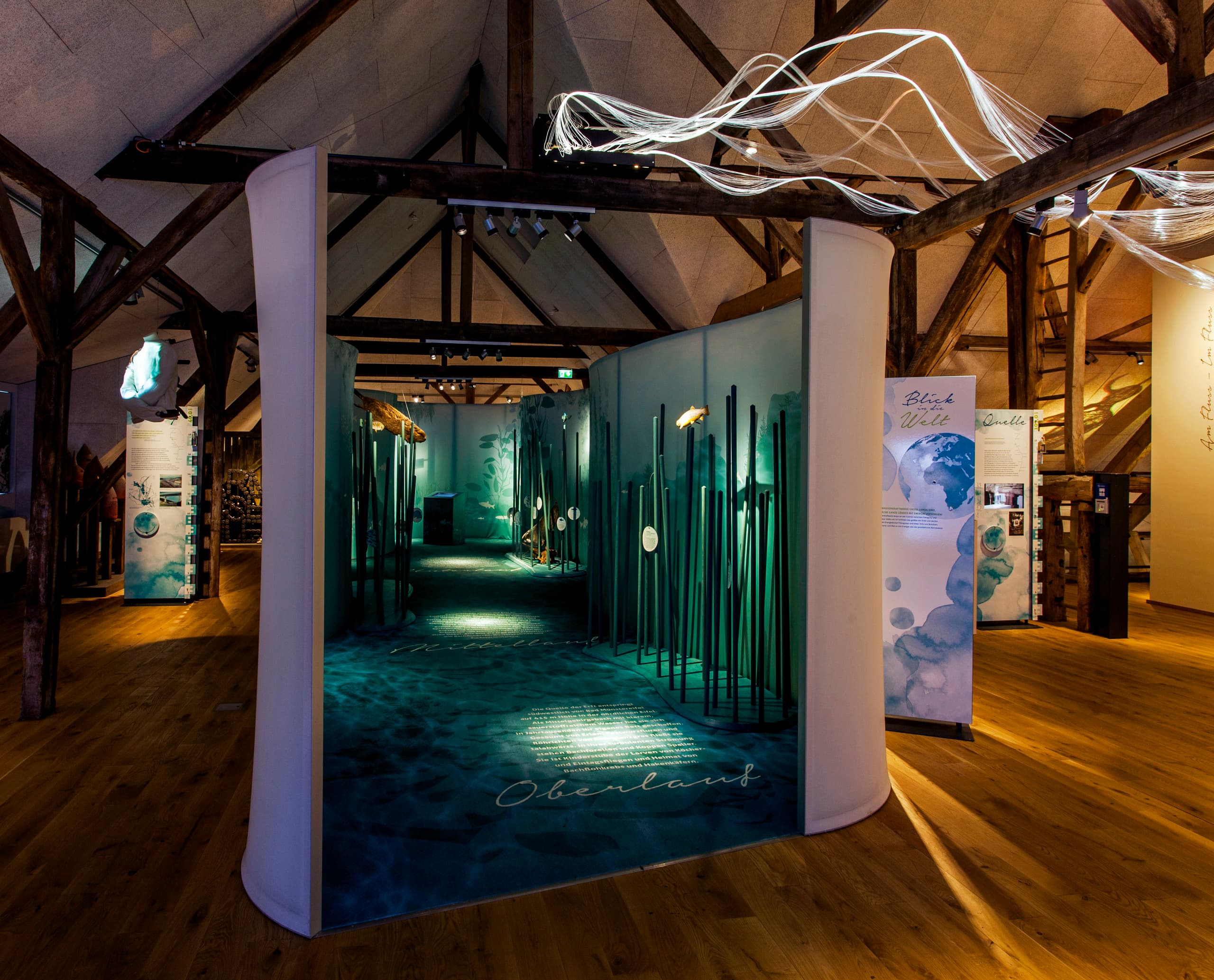 Gymnicher Mühle Museum: Interaktive Ausstellung mit ERCO LED-Beleuchtung in historischer Wassermühle.