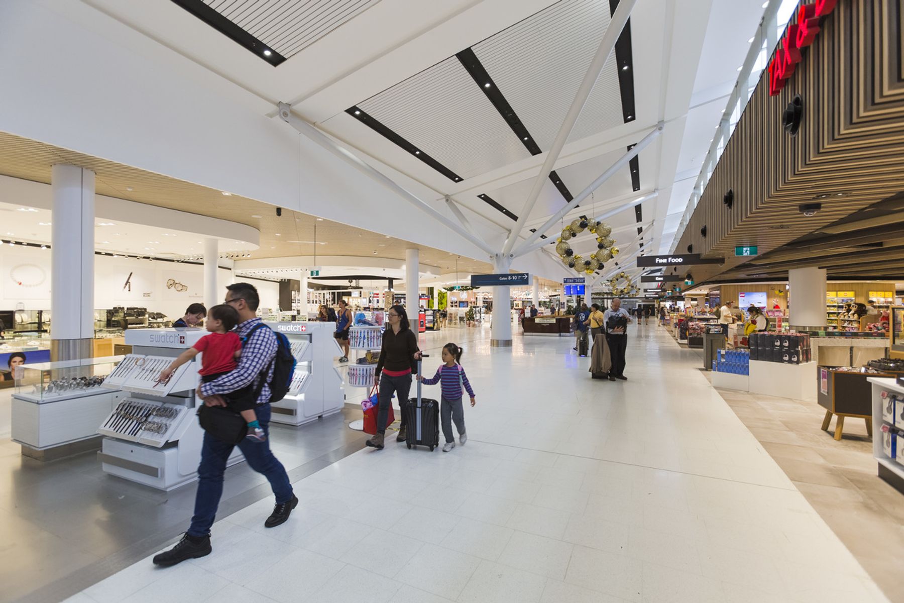 International Airport, Sídney. Diseño de iluminación y planificación eléctrica: Aurecon Sydney, Sídney. Fotografía: Jackie Chan, Sídney.